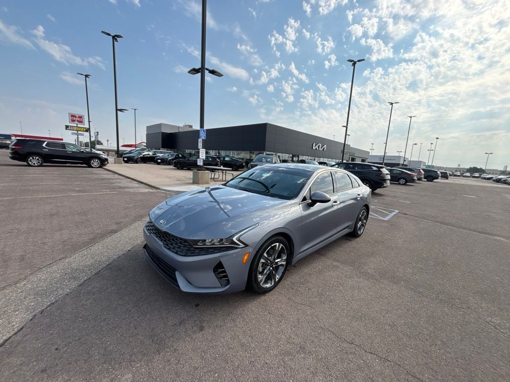 2021 Kia K5 EX in Everlasting Silver — front three-quarter view