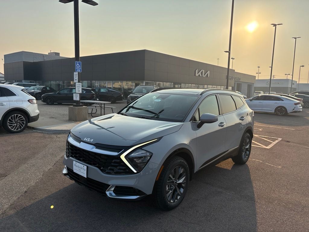 2023 Kia Sportage SX in Wolf Gray — front three-quarter view